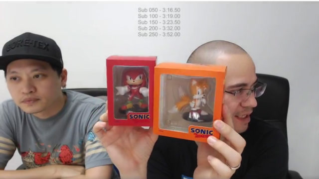 Alex Holding Boom8 Tails and Knuckles Figures