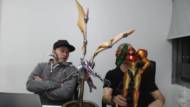 Metroid Meta Ridley Statue Next to Varia Suit Samus