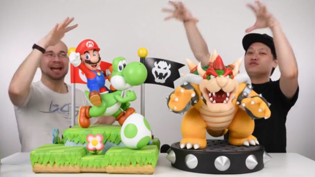 Comparison of Bowser and Mario on Yoshi Statues